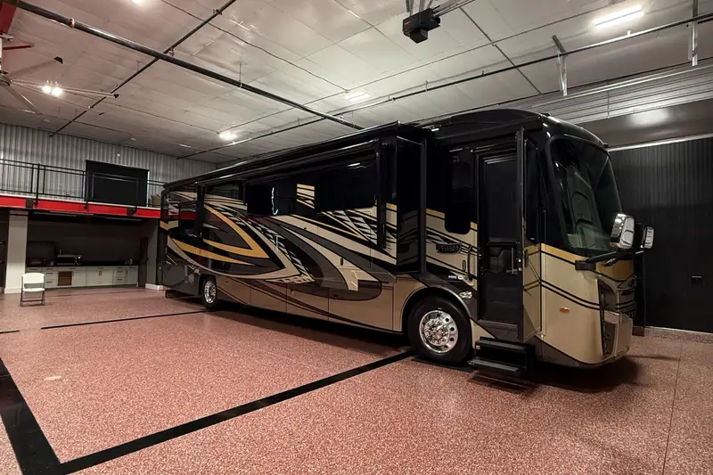 Motorcoach parked inside a GolfView garage bay