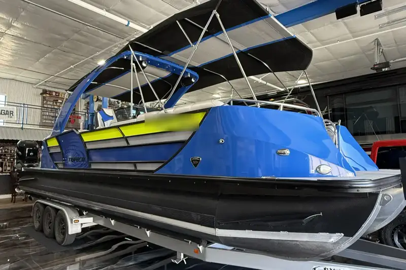Pontoon boat on its trailer inside a GolfView garage