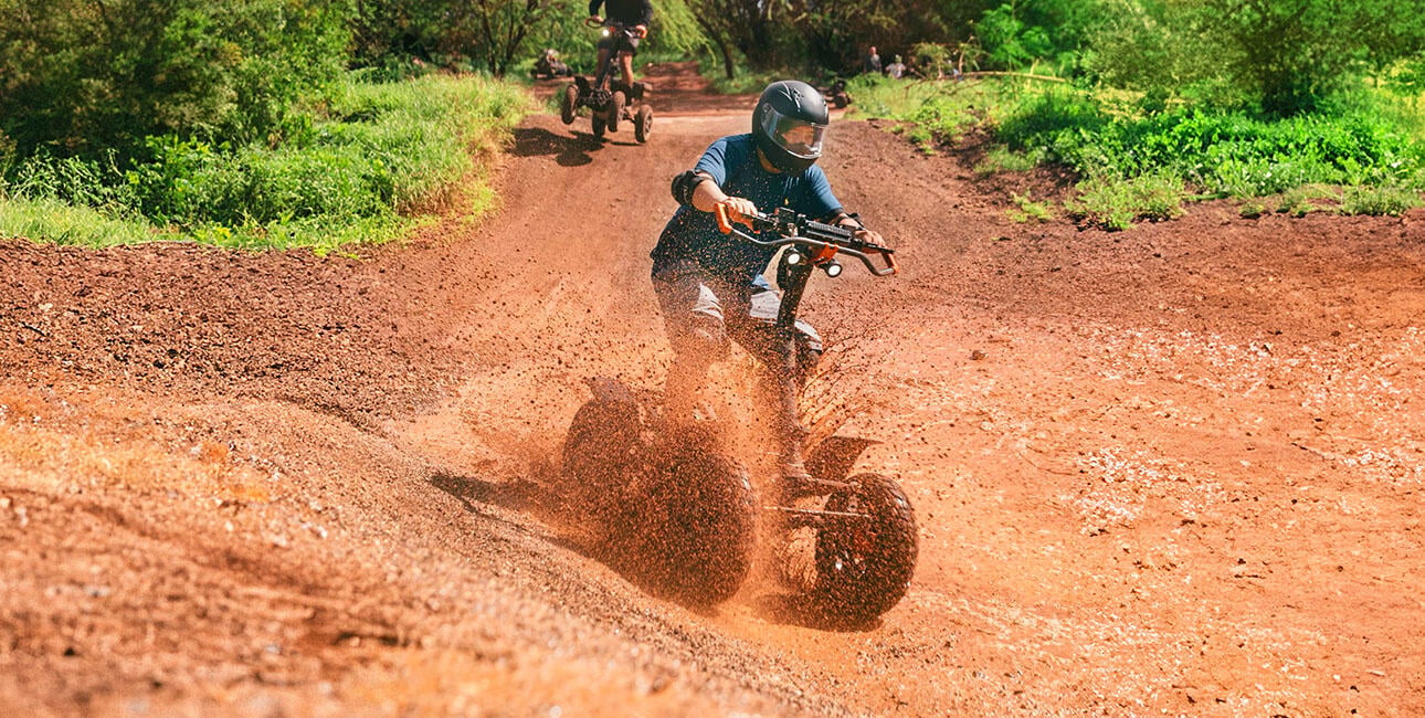 ATV rider on a mountain trail