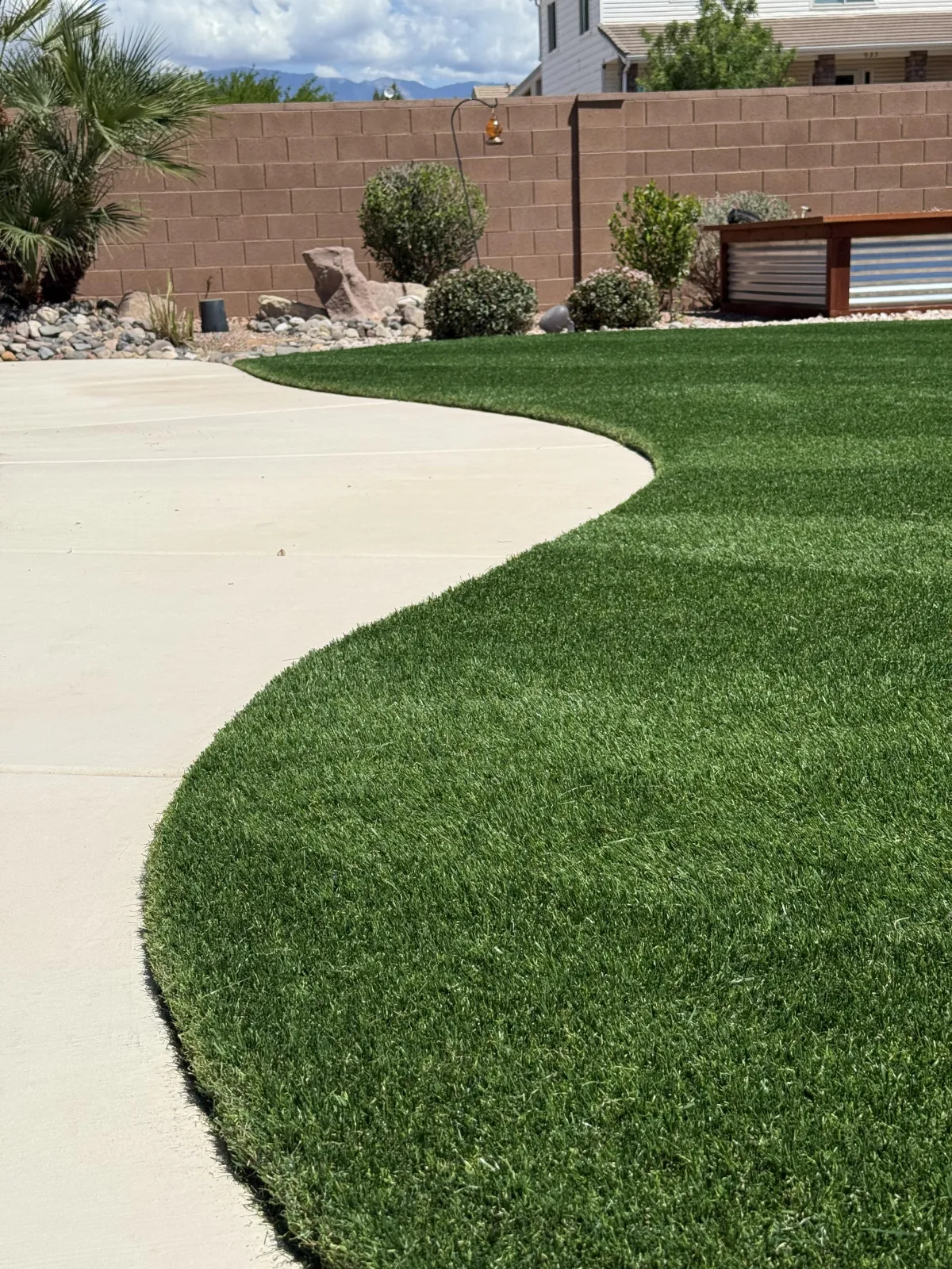 Lush artificial turf lawn installed in Washington County Utah by ZeroScape