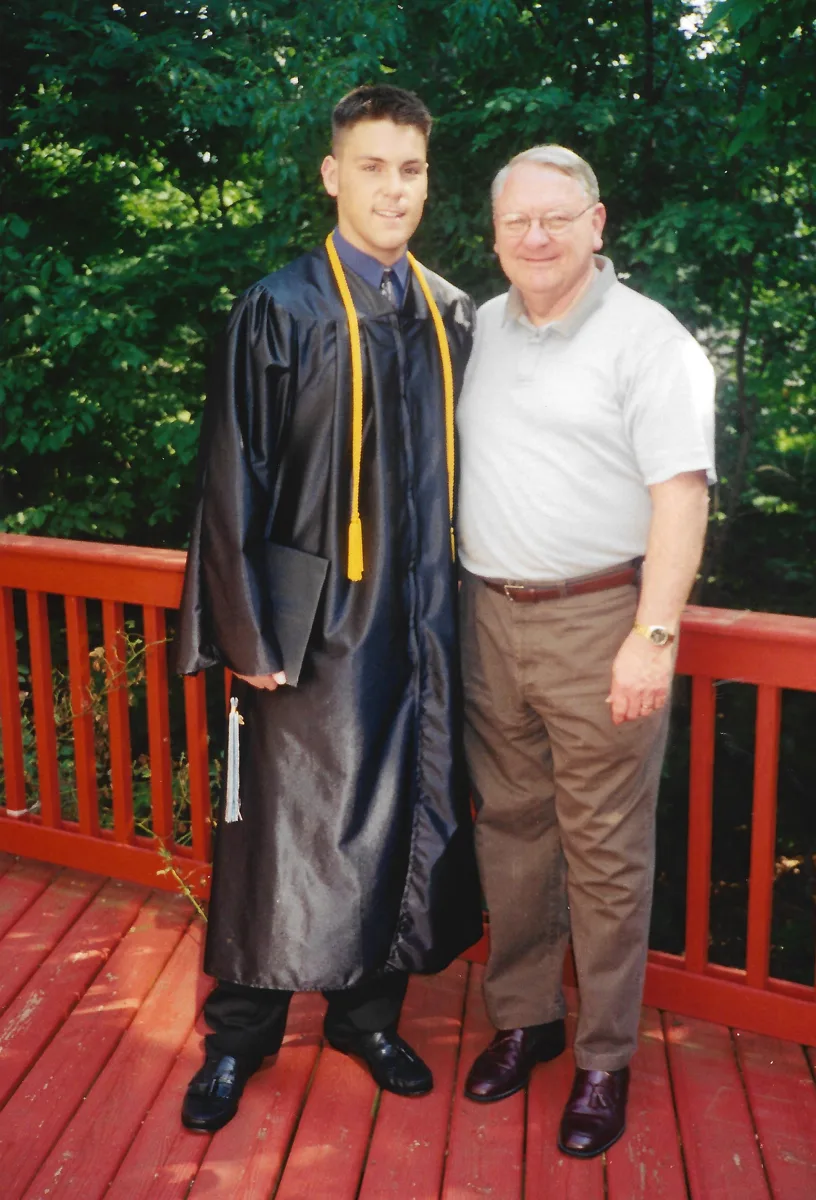 Matt and his dad at his high school graduation