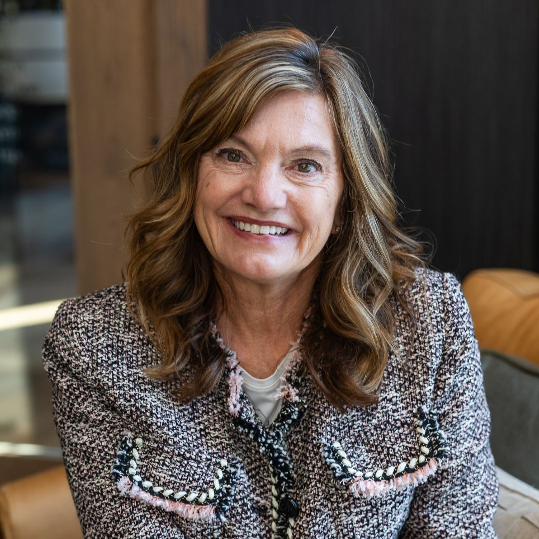 woman entrepreneur sharing results after improving profitability and decision making with business coaching