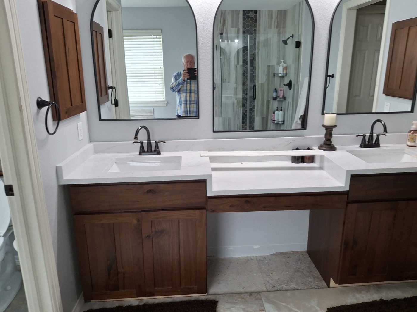 New double vanity with mirrors and modern fixtures after a Denver bathroom remodel