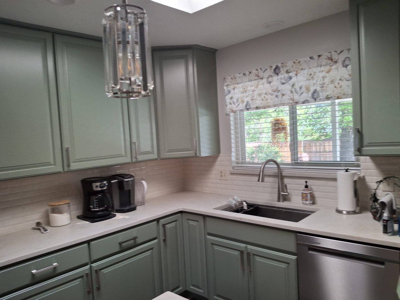 New kitchen cabinets, countertop and sink after a Denver kitchen renovation