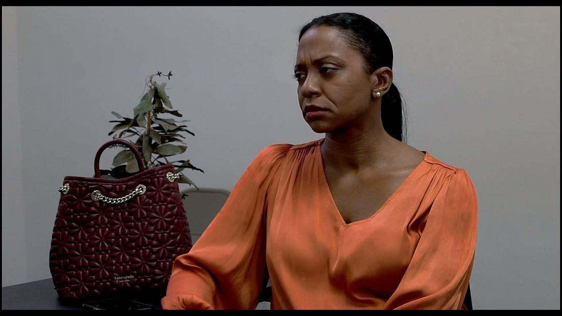 The Interviewer seated
