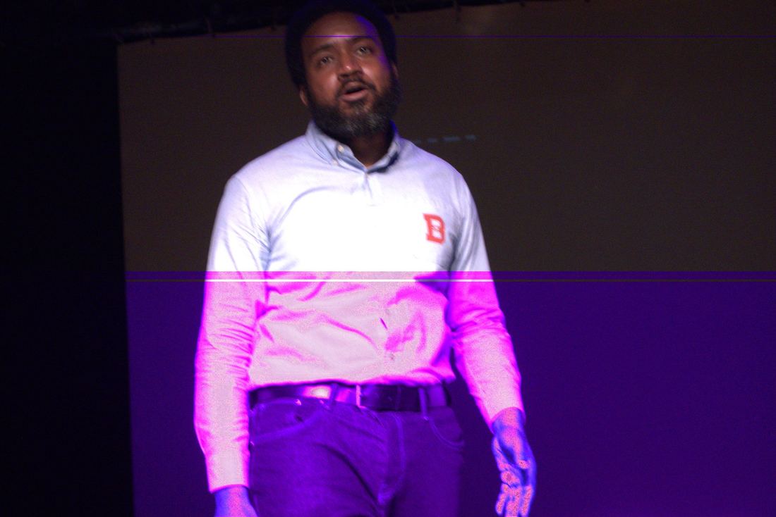 Actor standing center stage