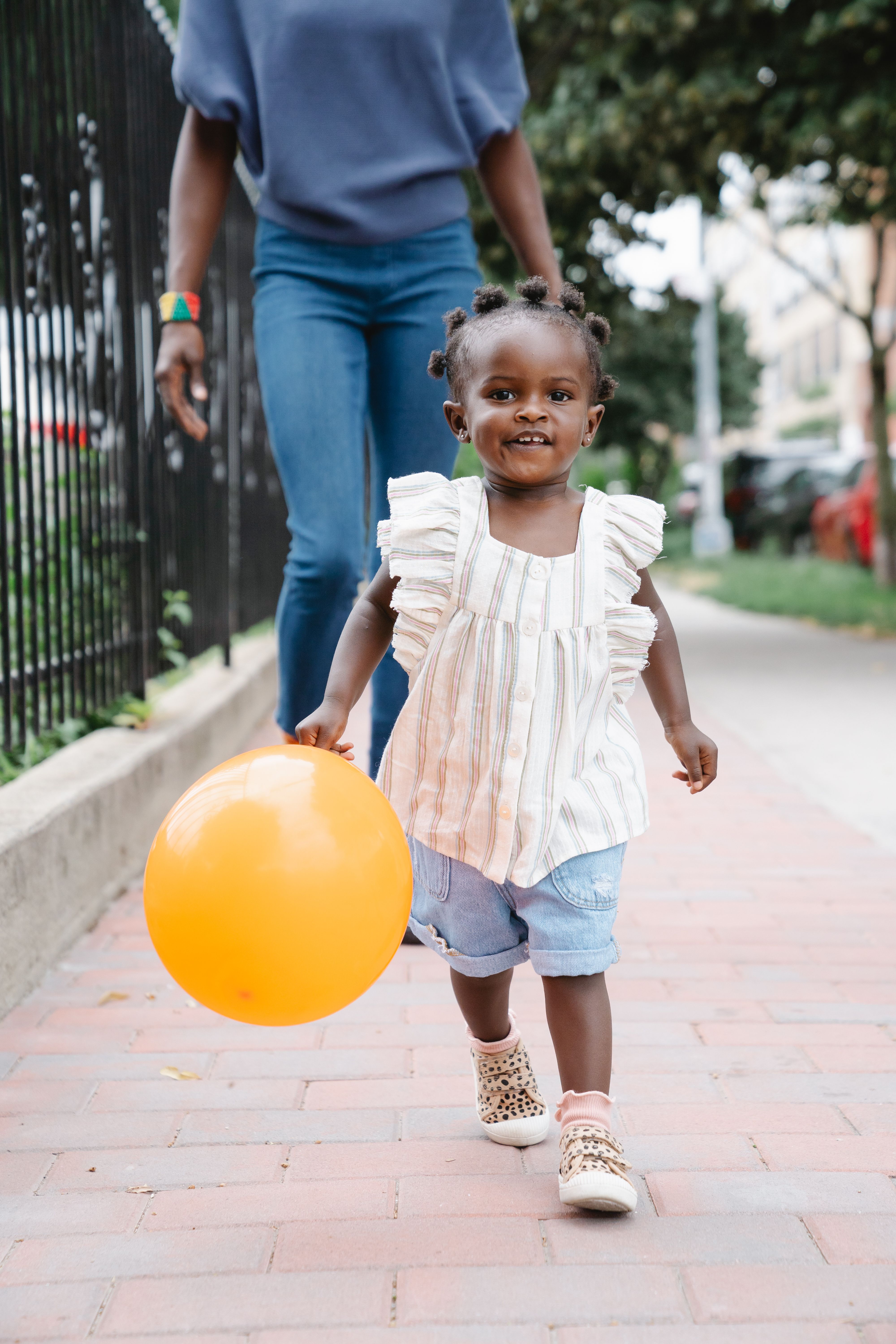 Girl on a walk with balloon