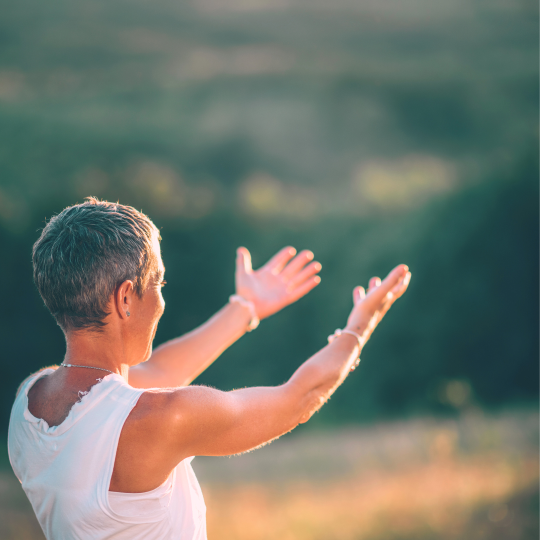 Everyday Sacred 49-Day funnel opt-in banner showing a woman in an open field with open arms, representing reconnection, chakra-aligned spiritual practices, and wholeness for midlife women