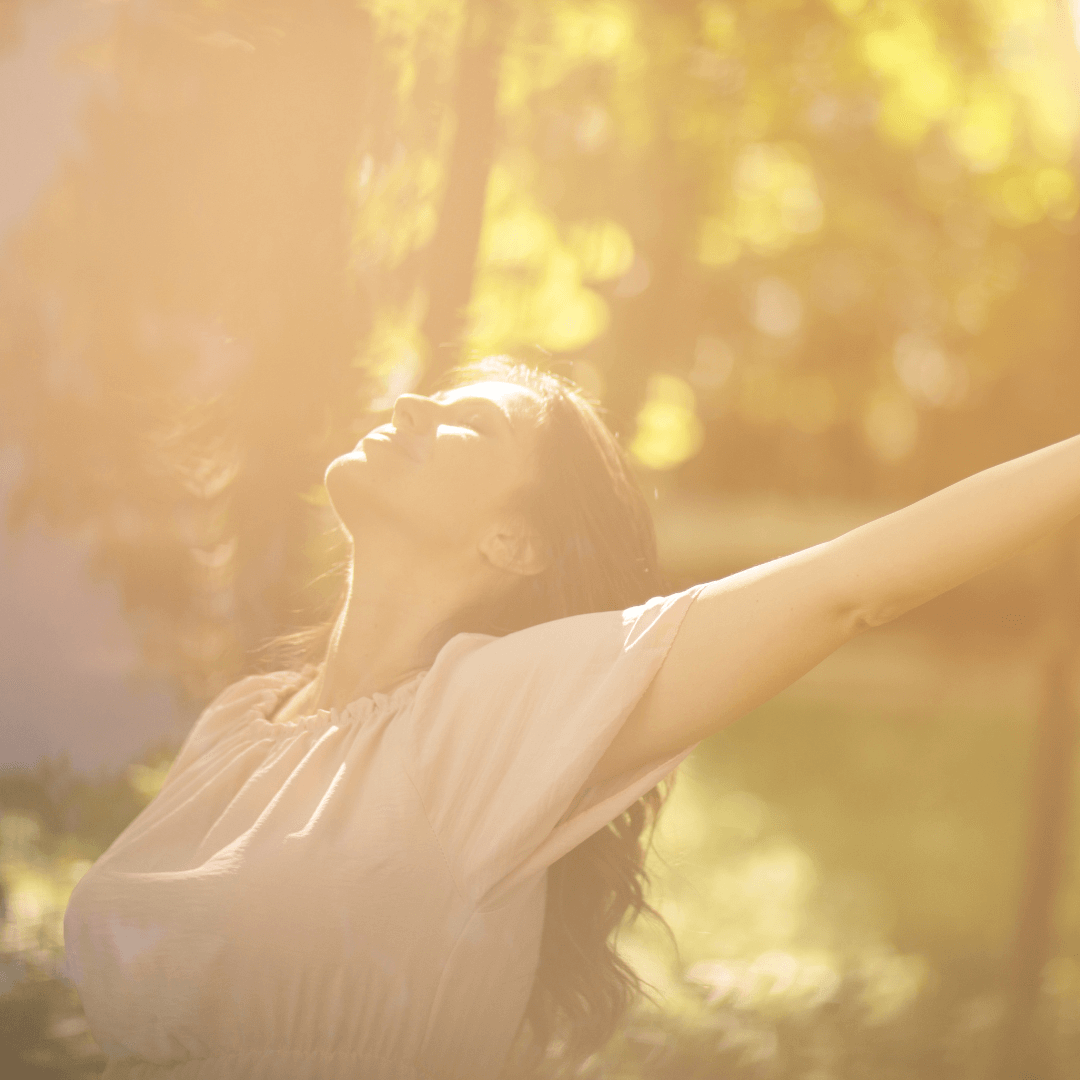 Soft & Sovereign 30-Day funnel opt-in banner showing a woman with open arms under trees with sunlight peeking through, representing the program’s transformative practices and journey to self-connection with Evelyn Foreman