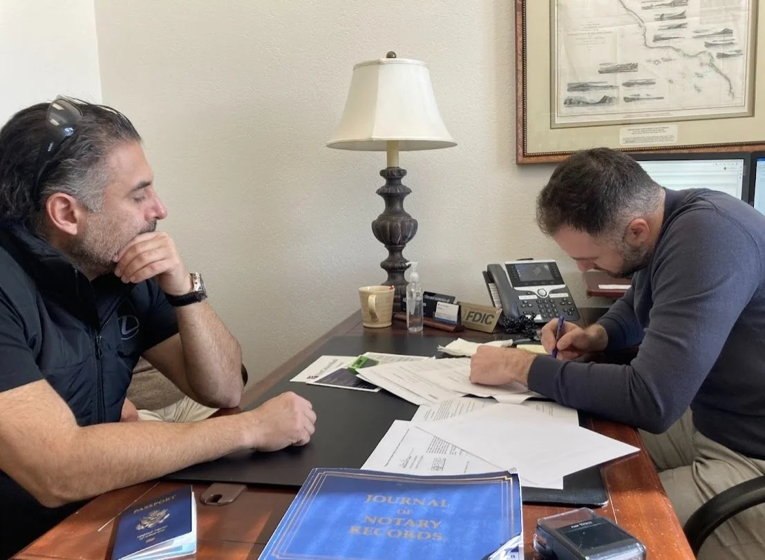 Mobile notary notarizing documents