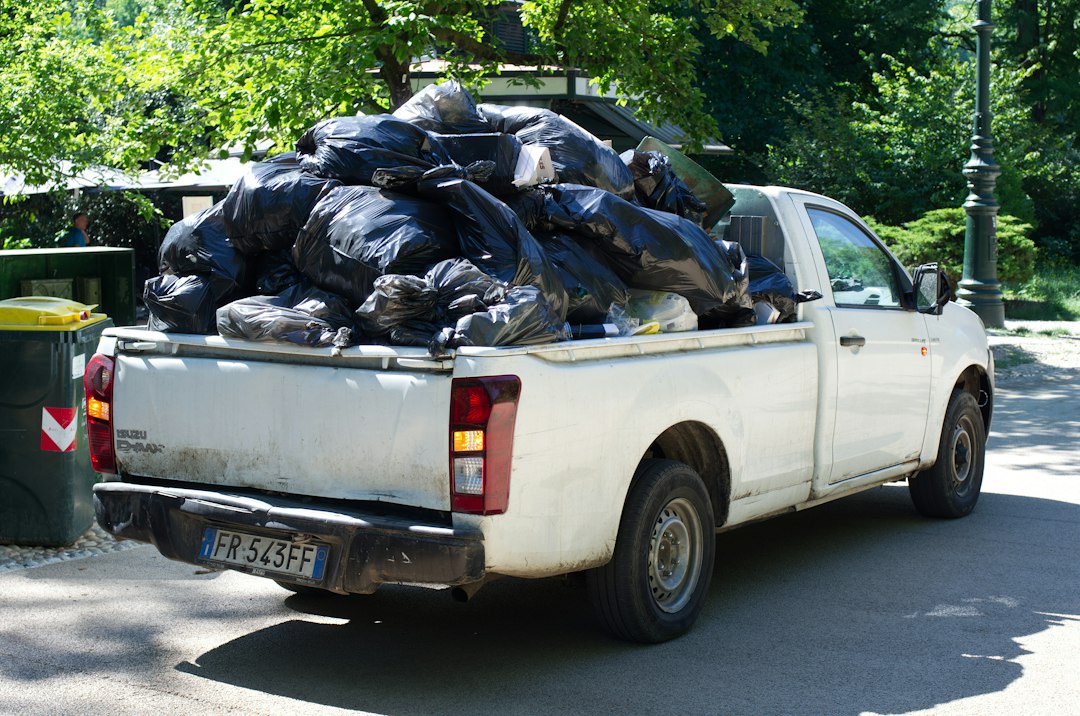 Pickup truck filled with black trash bags during a junk removal service call in Toronto.
