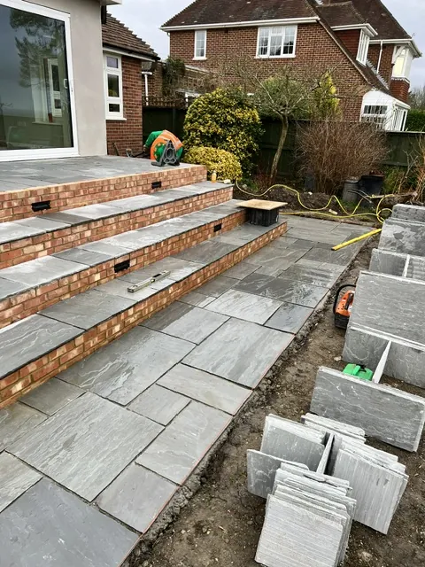 New patio steps and paving outside glazed doors