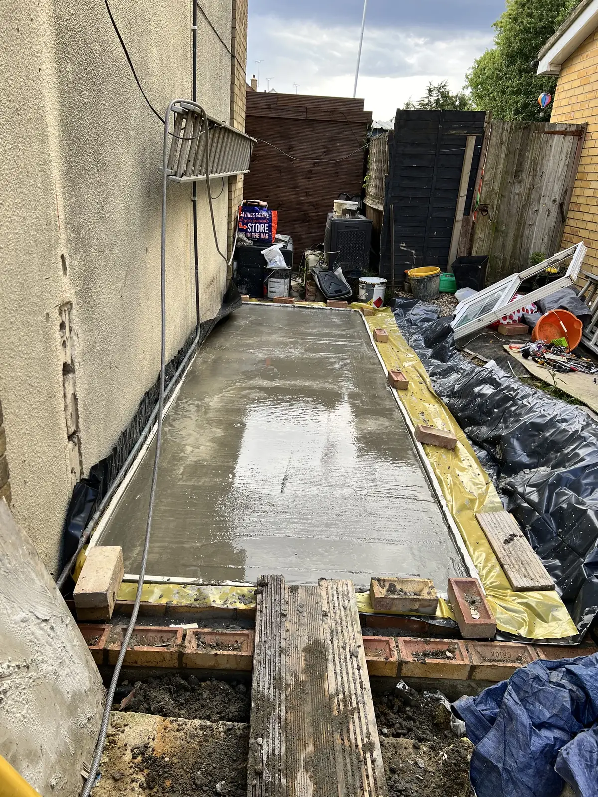 Fresh concrete slab for a side extension