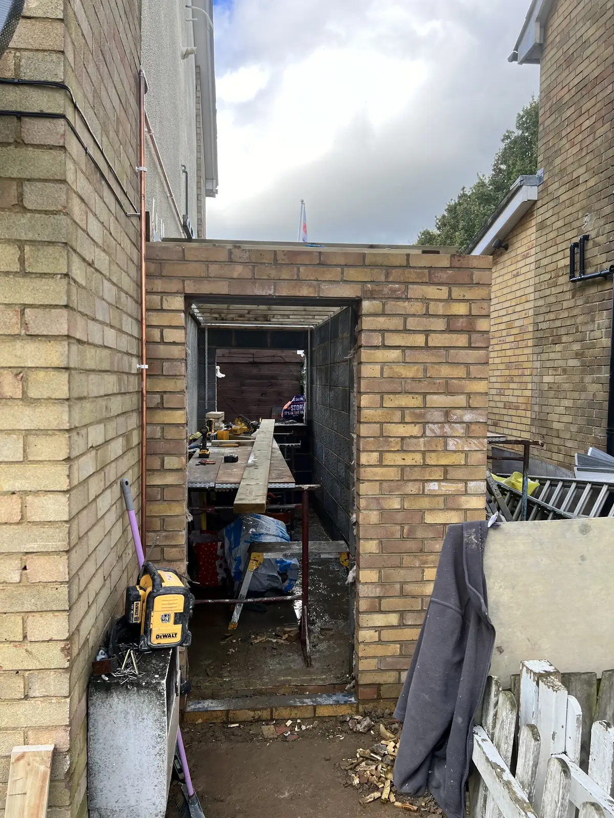 Brick shell of a single-storey side extension