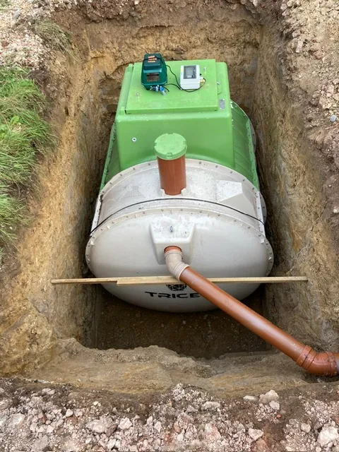 Underground tank set into an excavation with new pipework