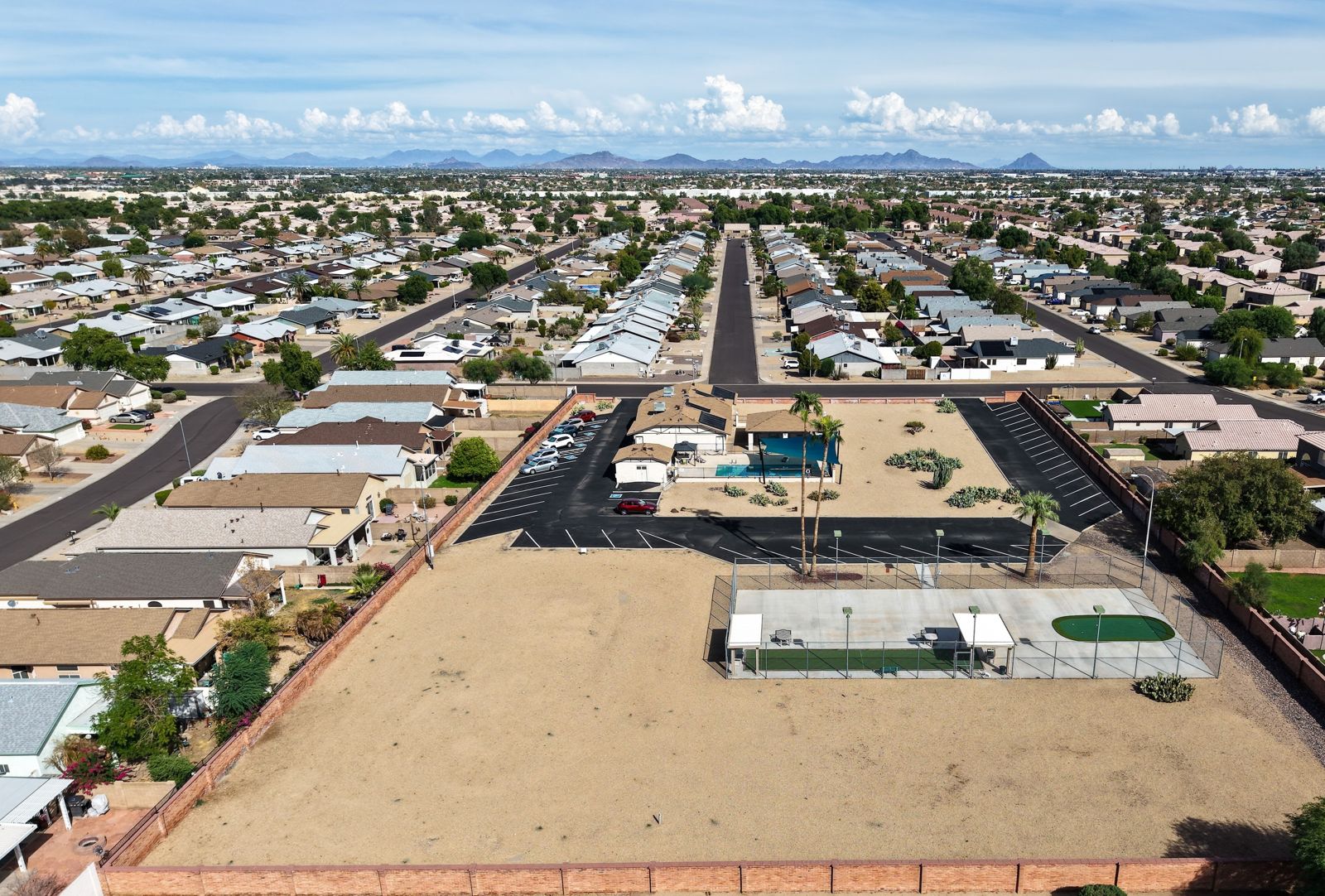 Our Rec Center, pool, courts, and the HOA lot behind them.