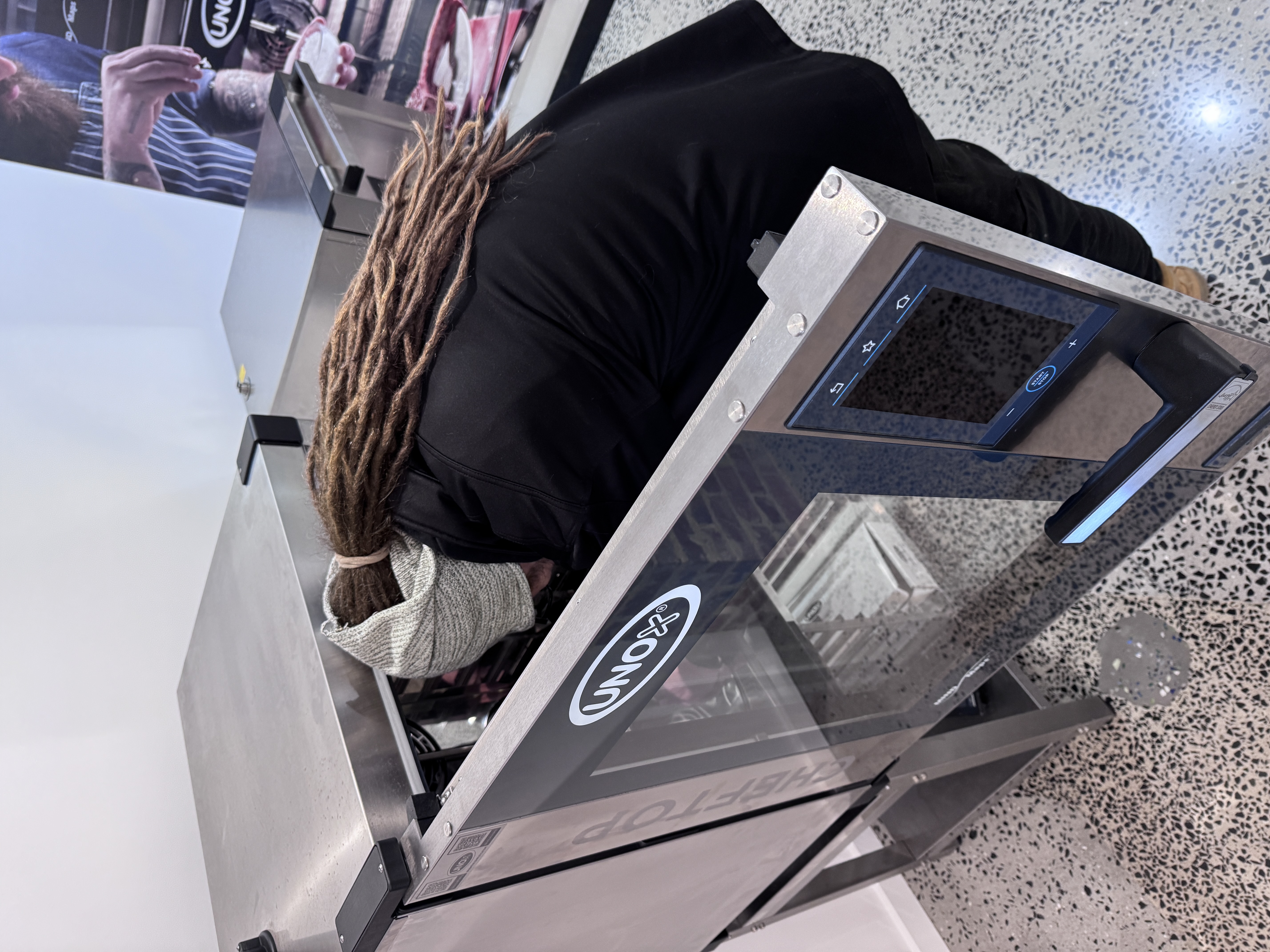 Hopwoods Repairs technician inspecting commercial appliance equipment