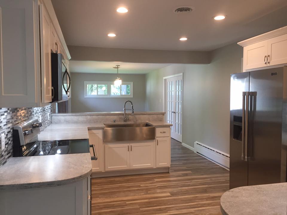 Kitchen Remodeling — White shaker cabinets, farmhouse sink, mosaic backsplash
