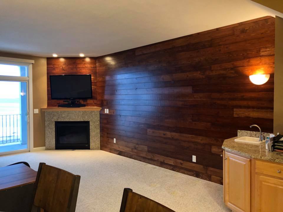 Home Remodeling — Custom shiplap wood plank accent wall with fireplace