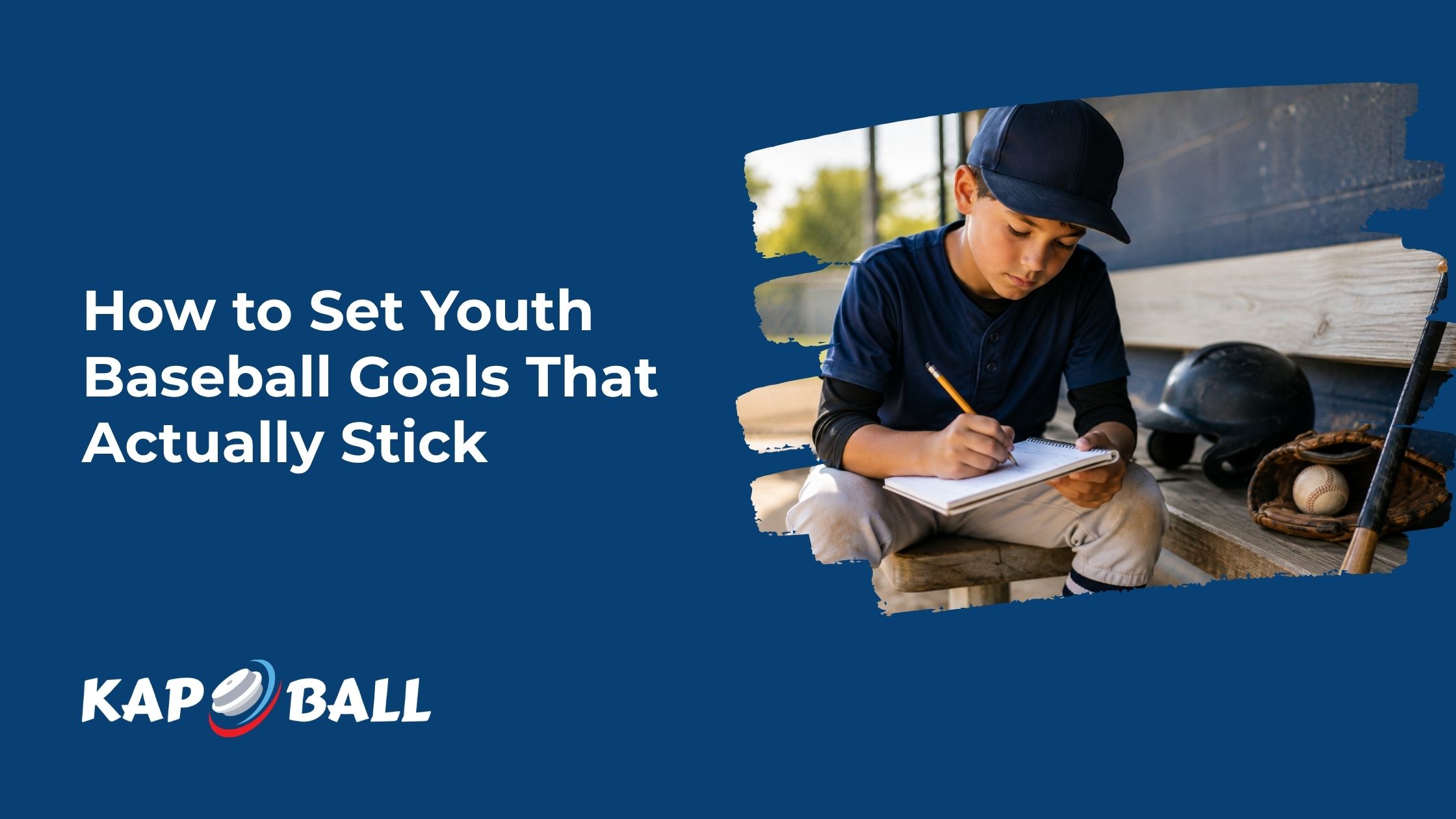 Young baseball player writing season goals in a notebook while sitting in the dugout Young baseball player writing season goals in a notebook while sitting in the dugout