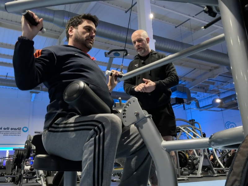 FitPro tutor overseeing a practical training assessment