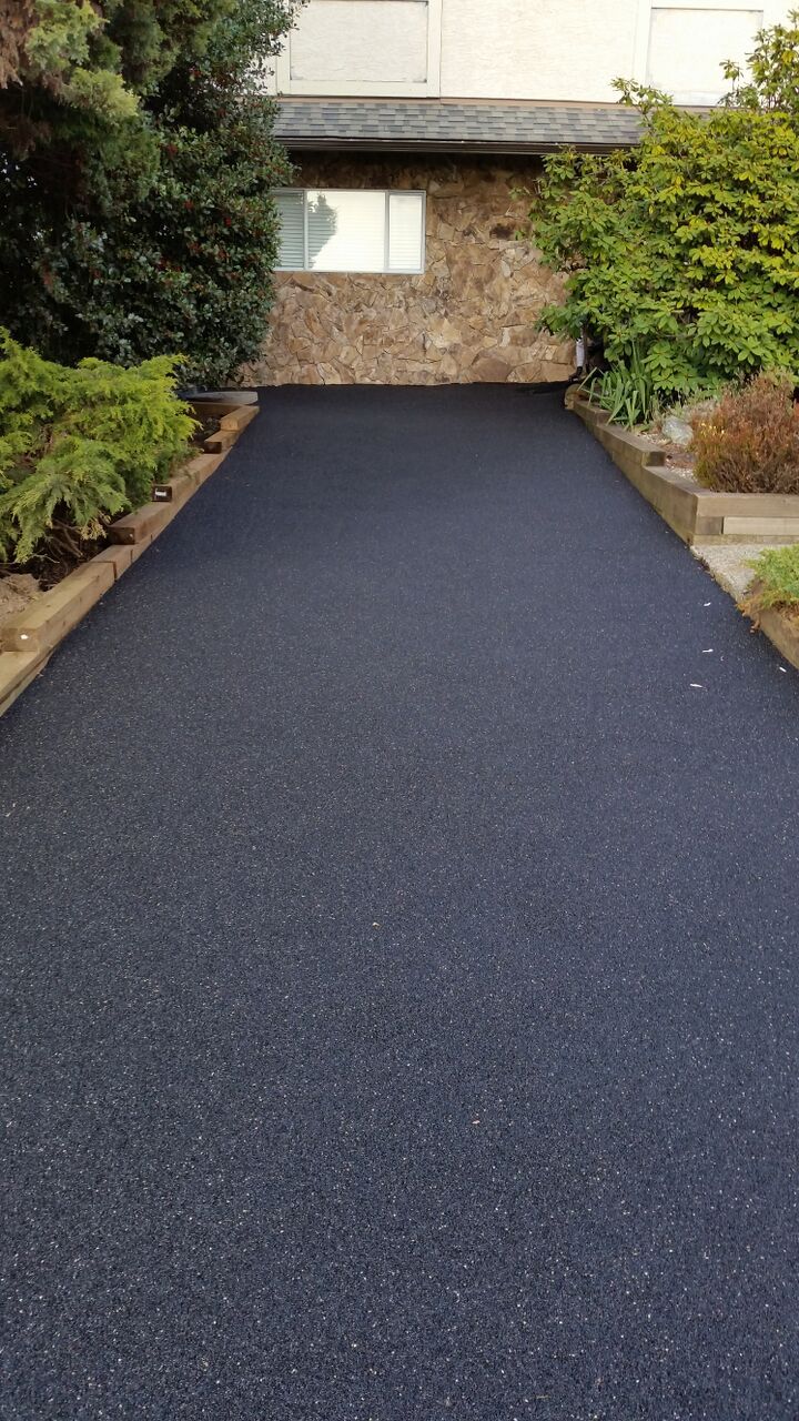 before and after epoxy flooring installation for residential garage in Evergreen