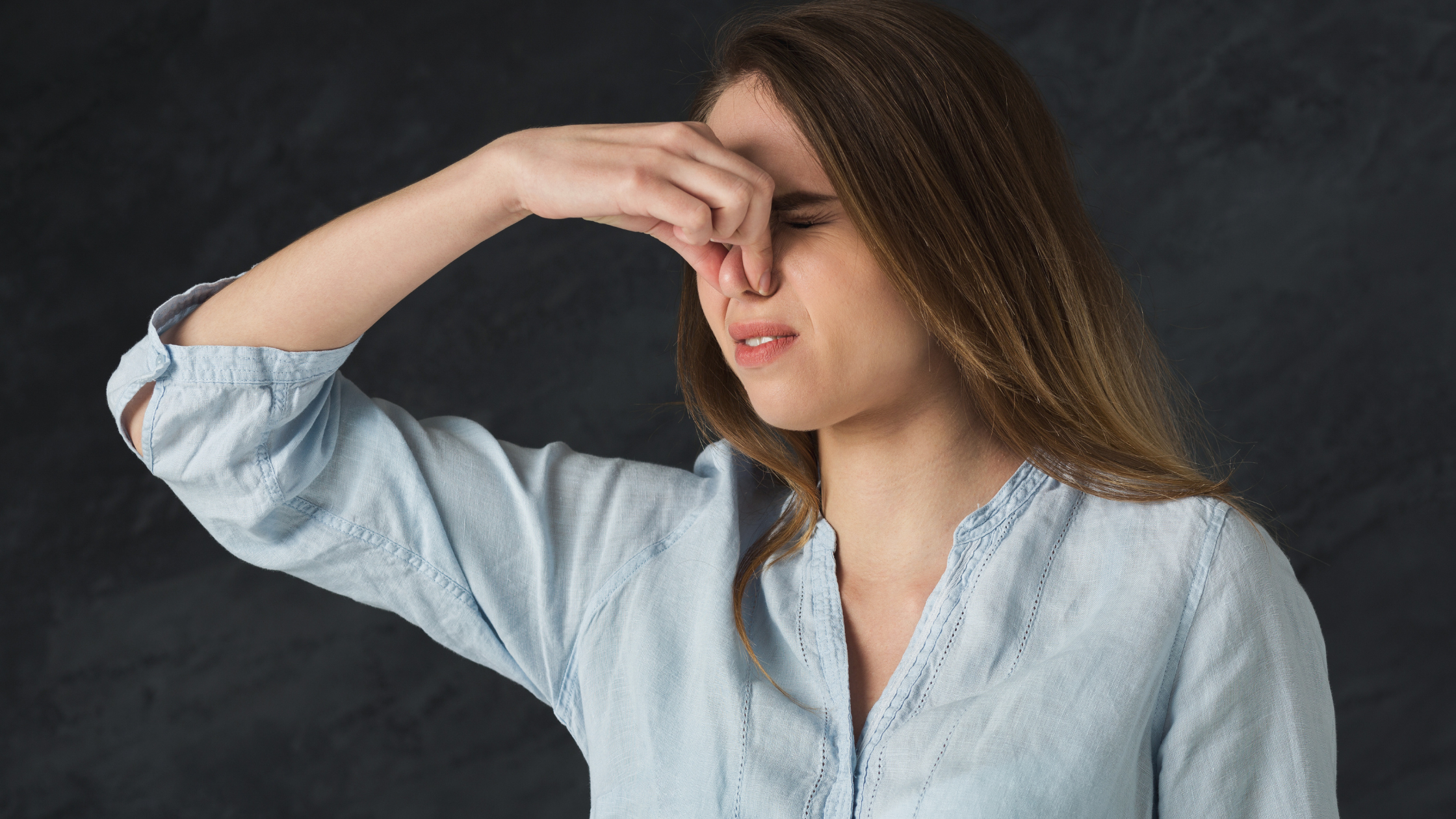 Signs of mold in apartment wall near window frame
