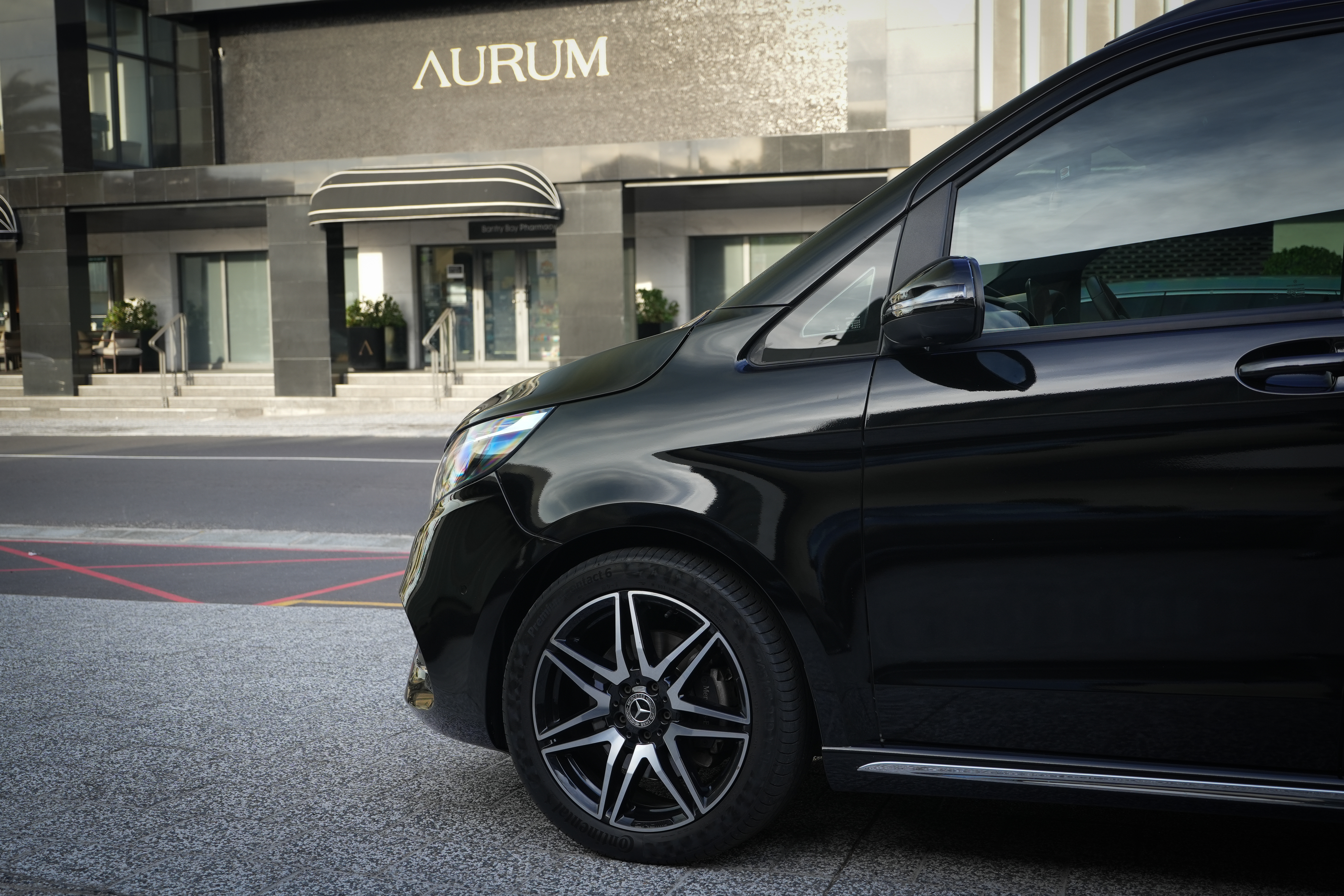 Black 2024 Mercedes-Benz V-Class V300d exterior detail view.