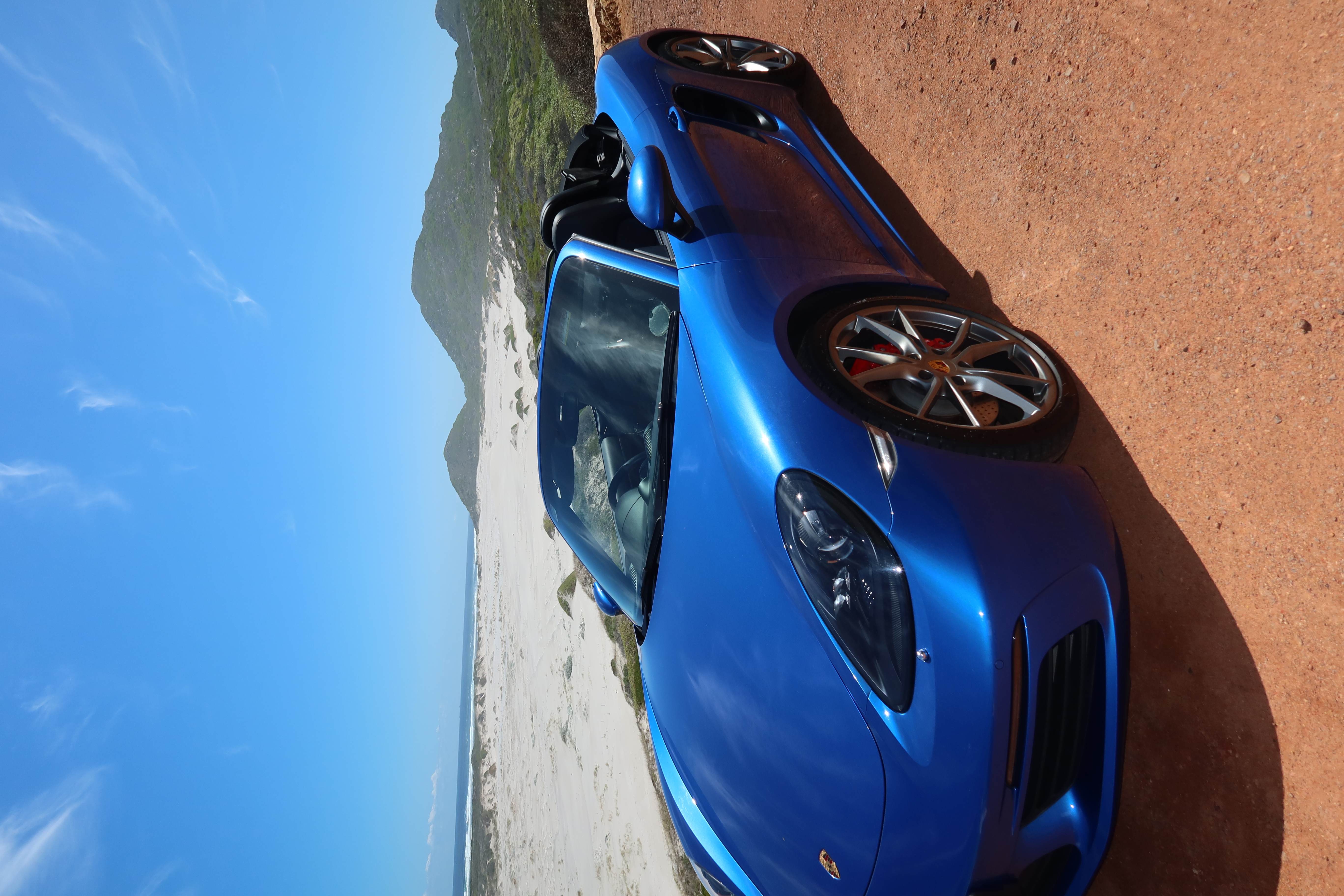 Blue 2017 Porsche Boxster 718 S front angle view for hire in Cape Town.