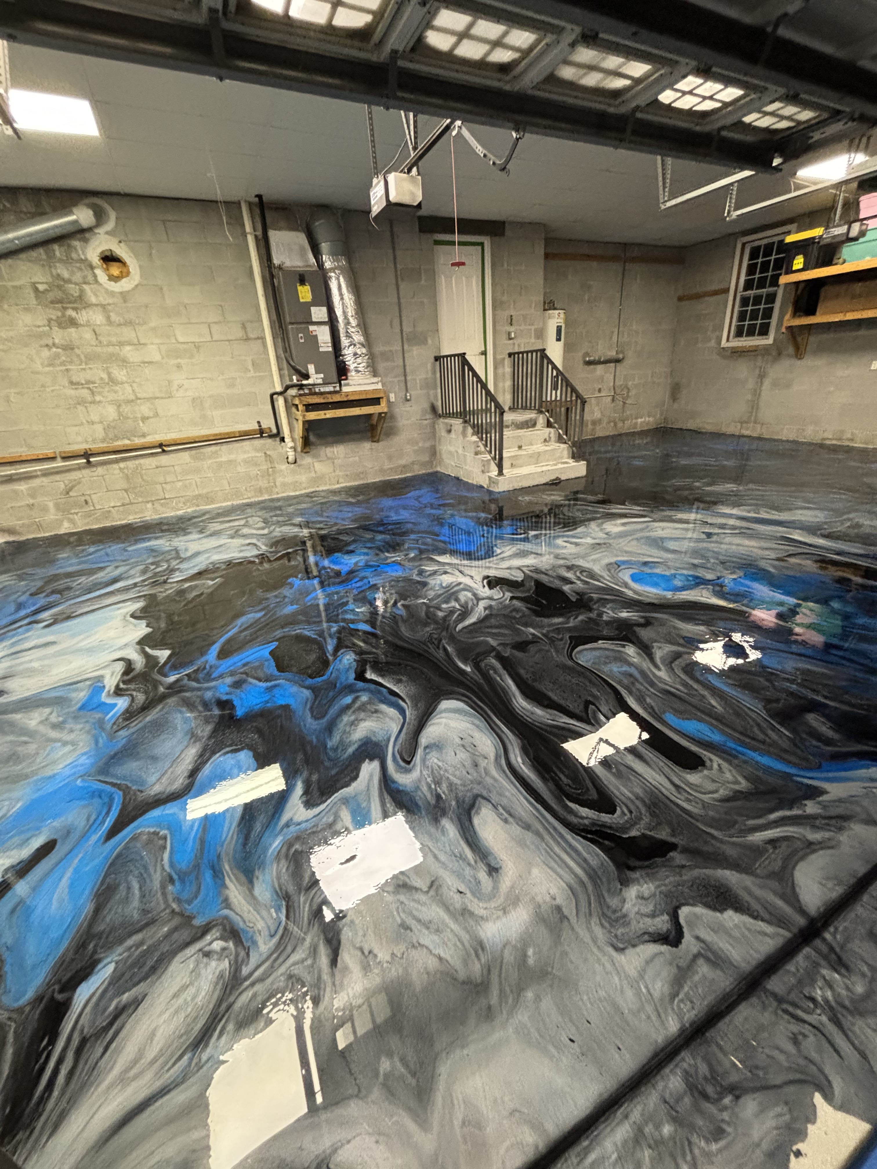 White marble-vein metallic epoxy garage floor