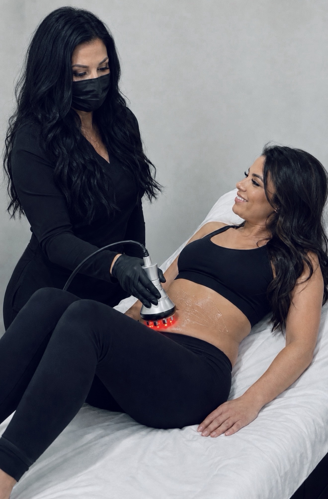 Tara performing a body sculpting treatment