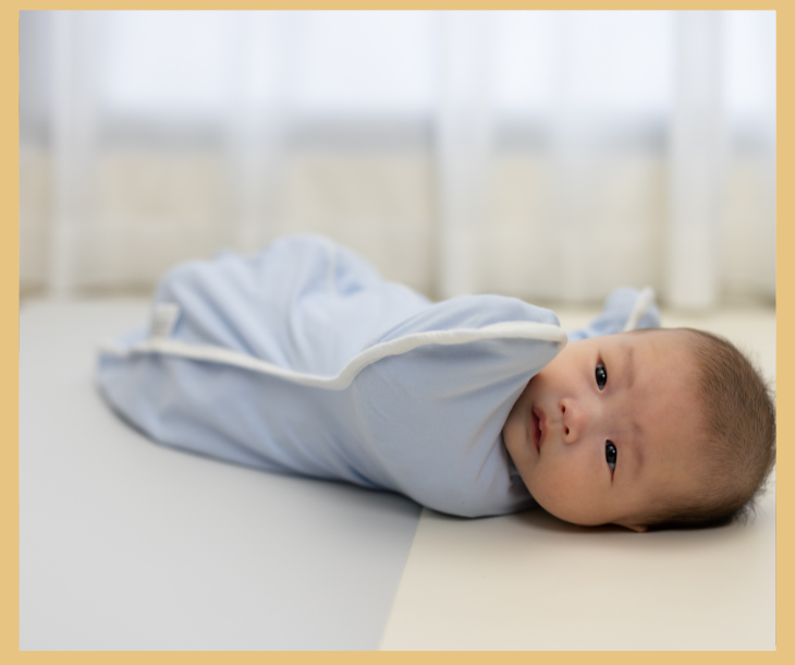 A baby laying in a cot demonstrating safe sleep practices A baby laying in a cot demonstrating safe sleep practices