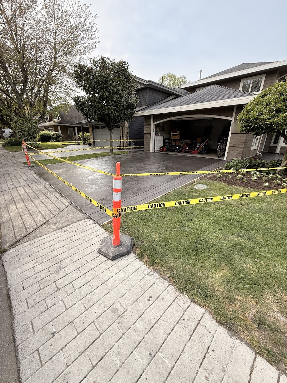 Finished stamped concrete driveway viewed from the sidewalk in Steveston, Richmond BC