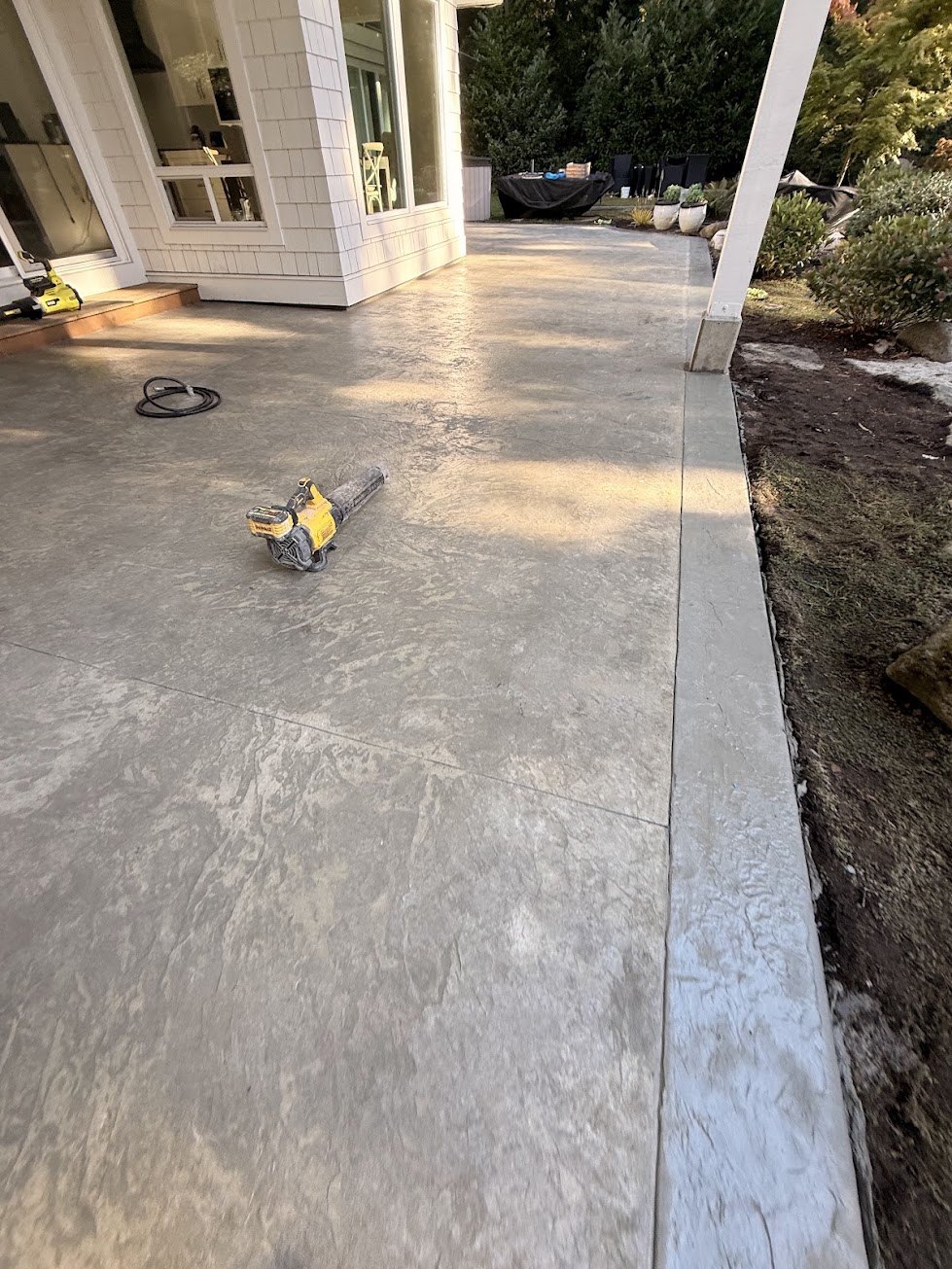 Italian slate stamp texture and border on a stamped concrete patio in Surrey BC