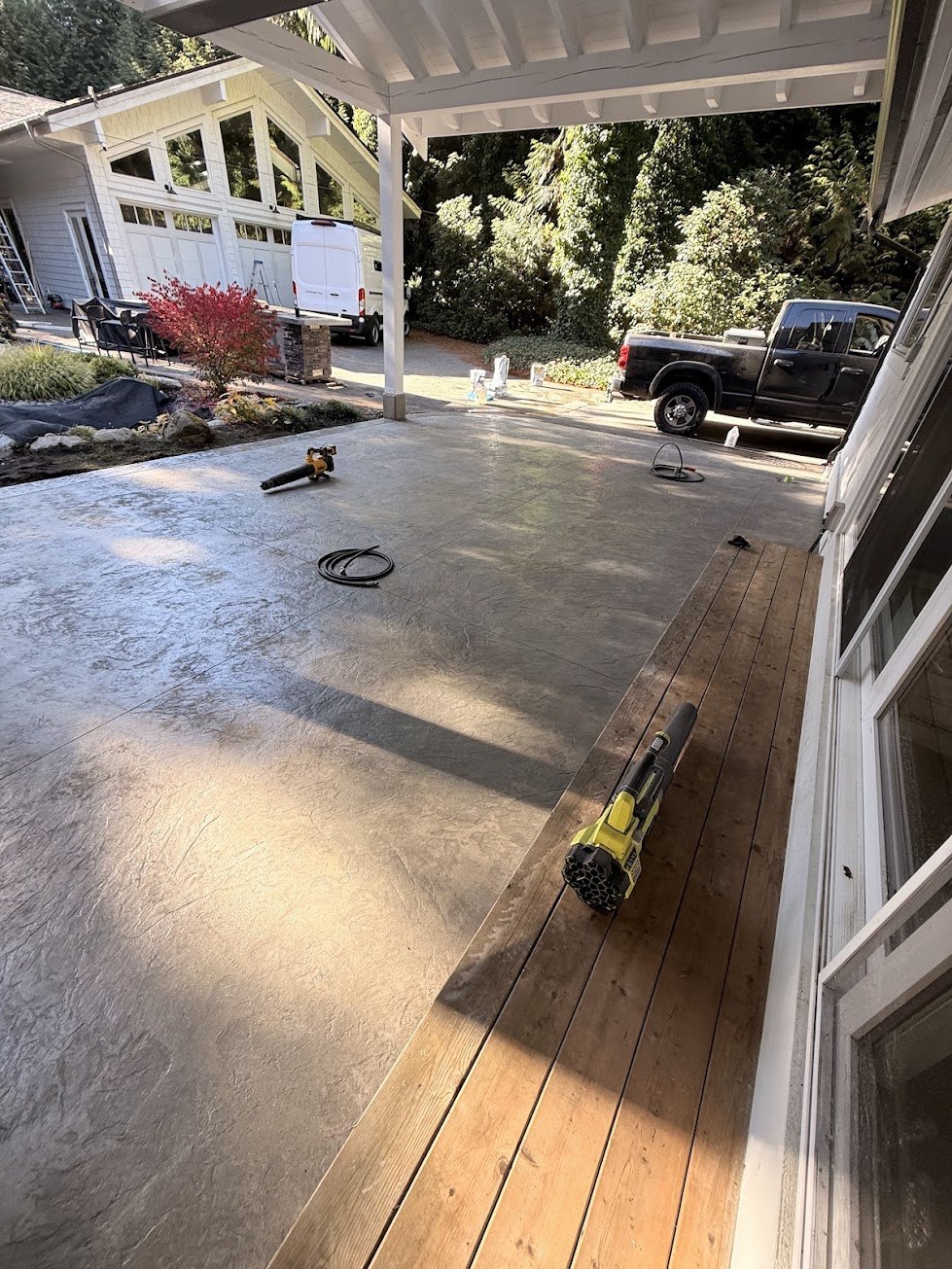 Finished stamped concrete patio under a covered area in Surrey BC