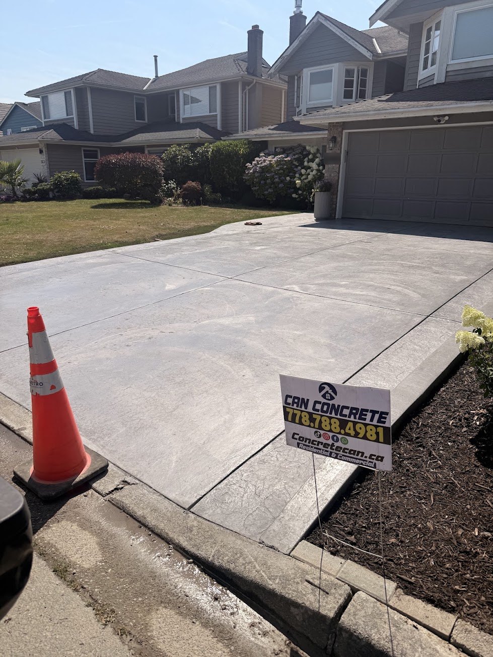 Finished coloured concrete driveway viewed from the front in Steveston, Richmond BC