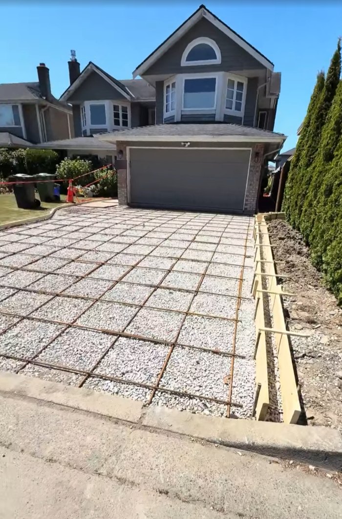 Rebar grid laid out for a new concrete driveway in Steveston, Richmond BC