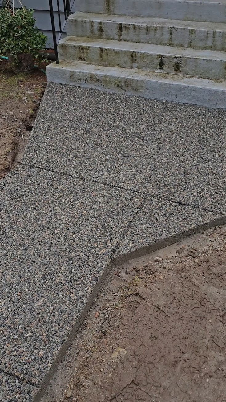 Exposed aggregate landing at the front steps
