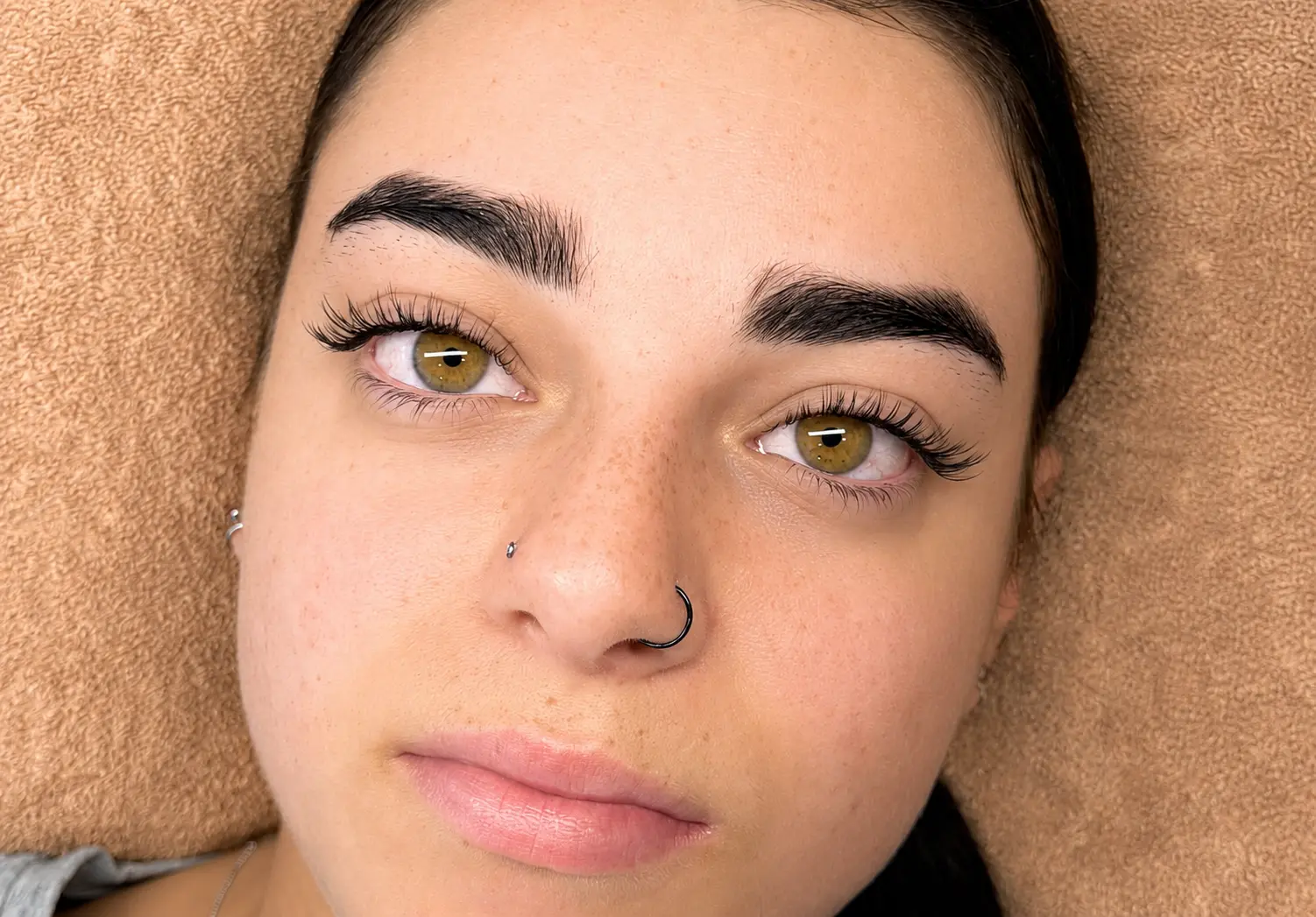 Client wearing Natural but Noticeable lashes