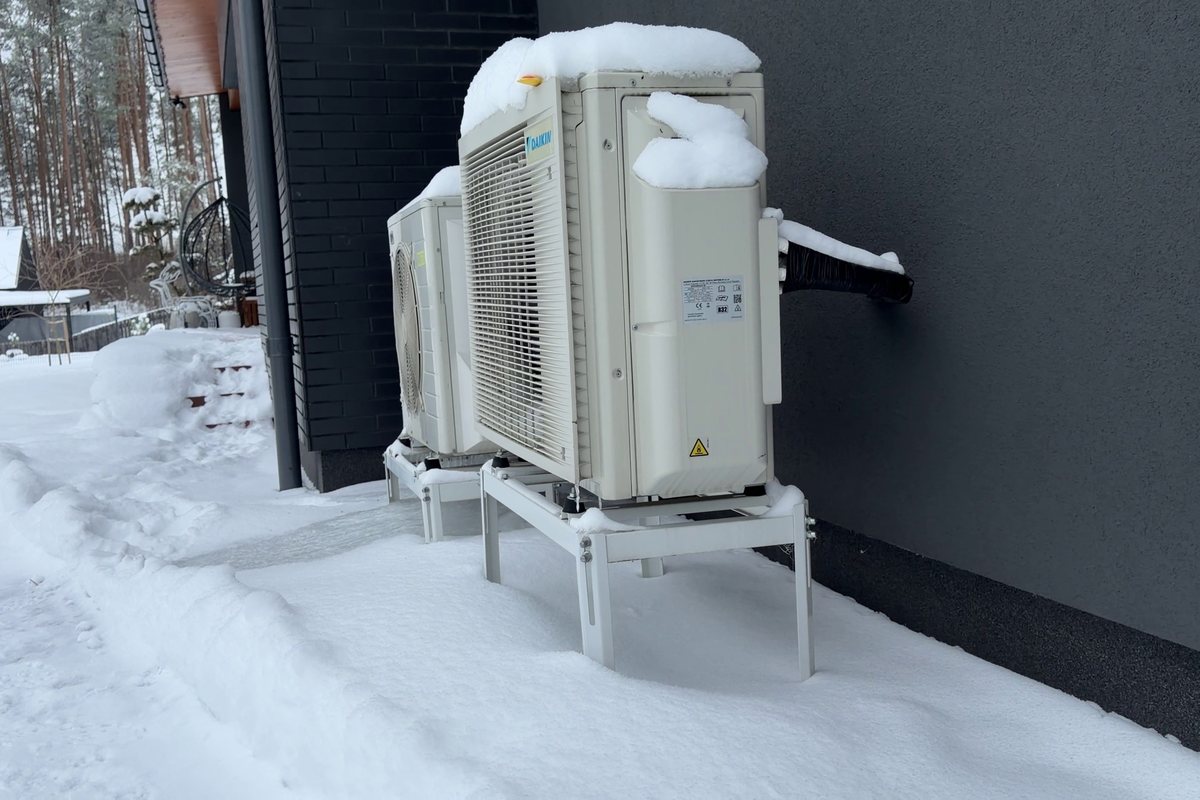 Heat pump outdoor unit in snow