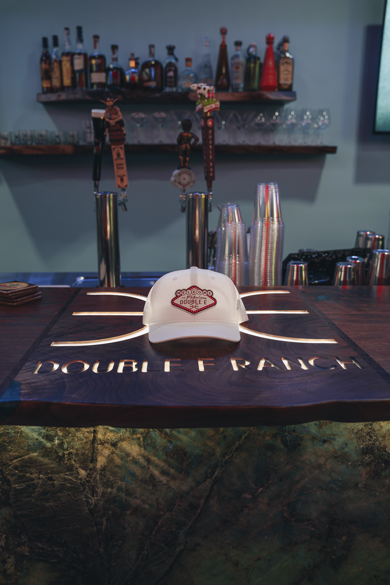 Double E Lifestyle bar and grille with Double E Ranch logo and branded merchandise.