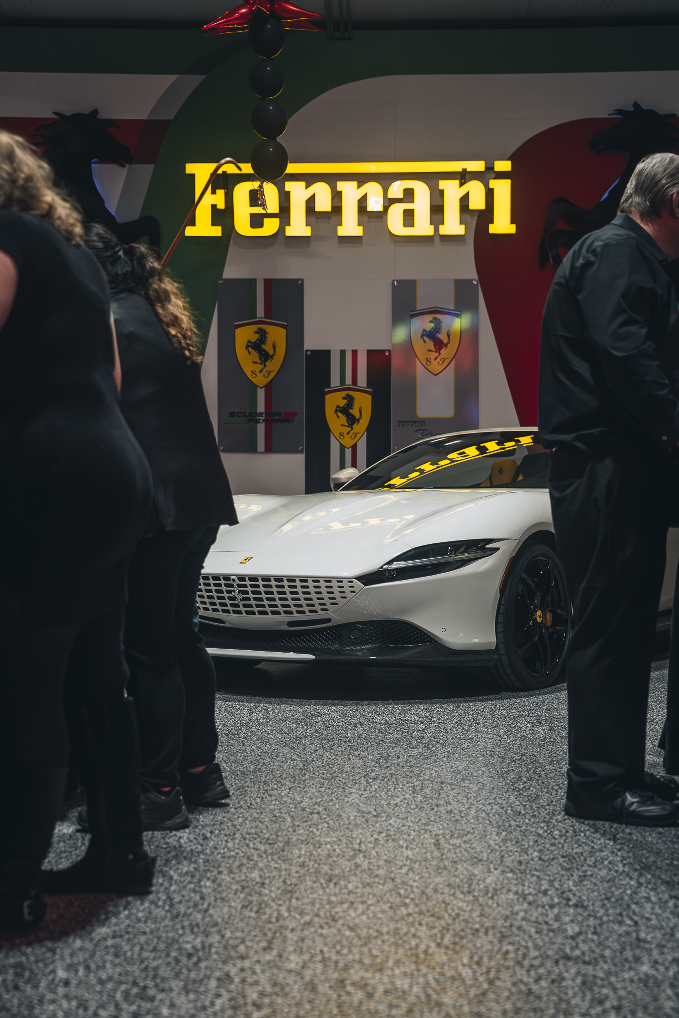 Double E Lifestyle event featuring a Ferrari and guests in Texas.