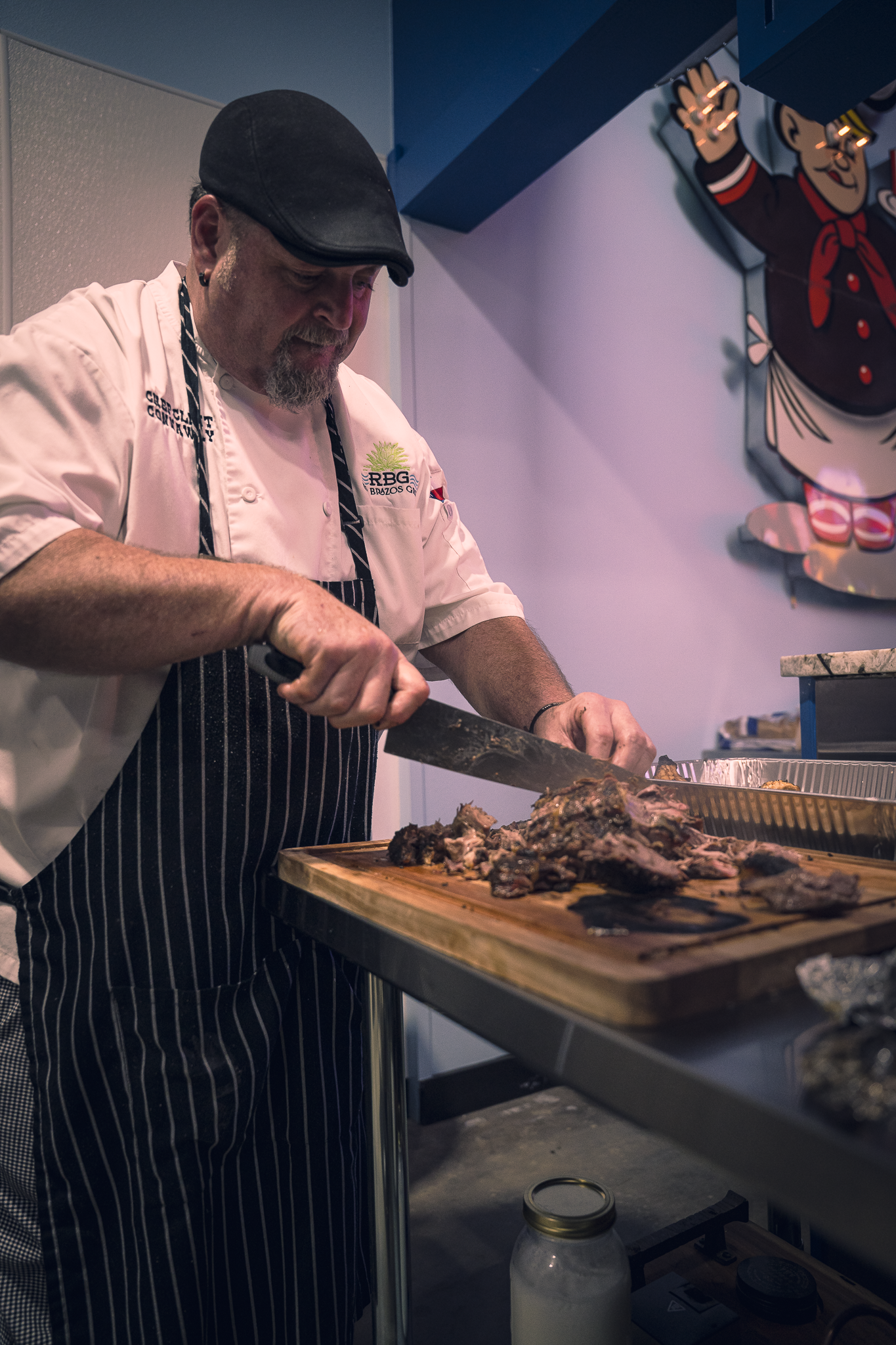 Chef preparing food at Double E Lifestyle event in Texas.