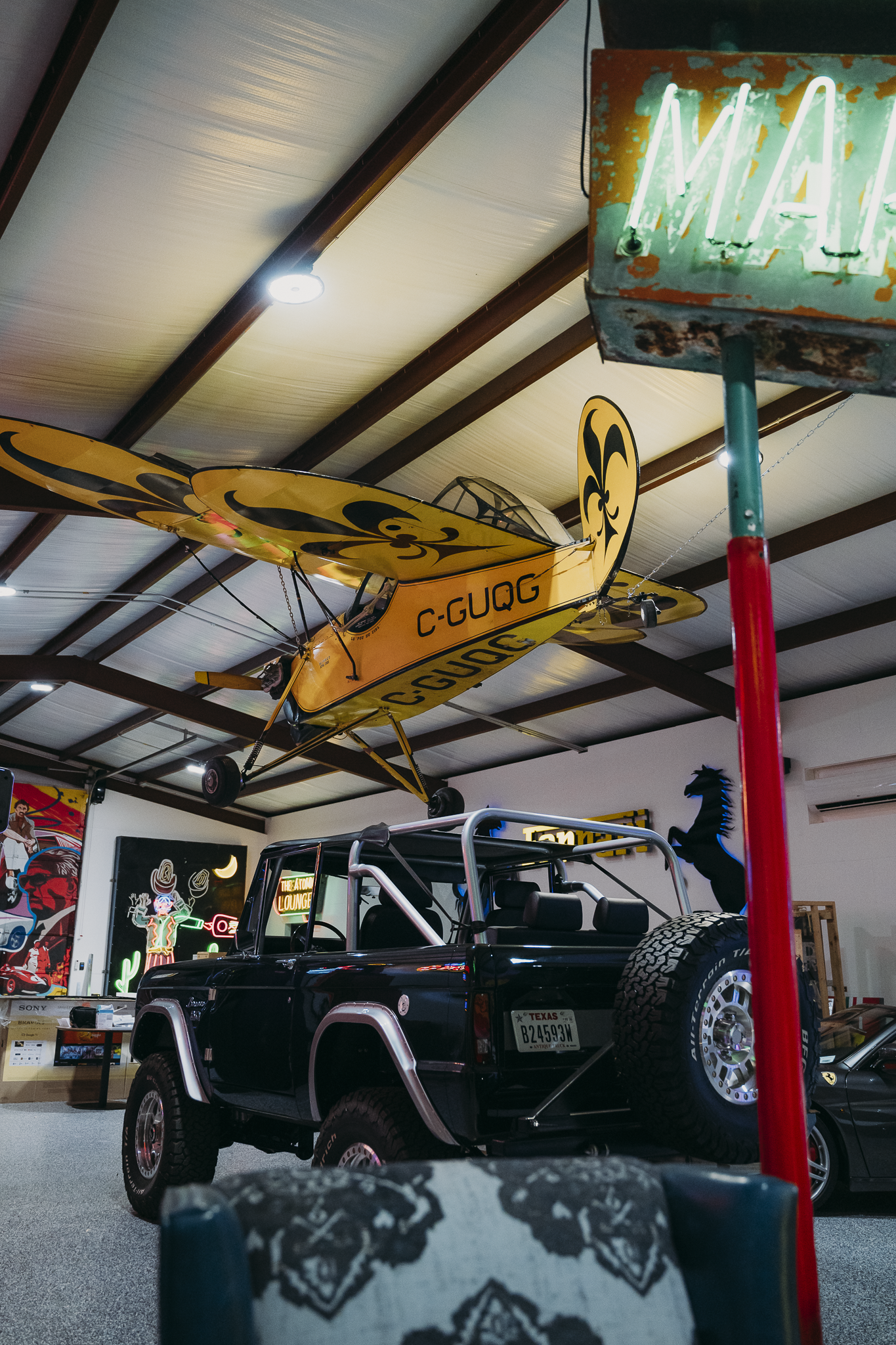 Double E Lifestyle venue showcasing vintage airplane and custom Jeep, Texas.