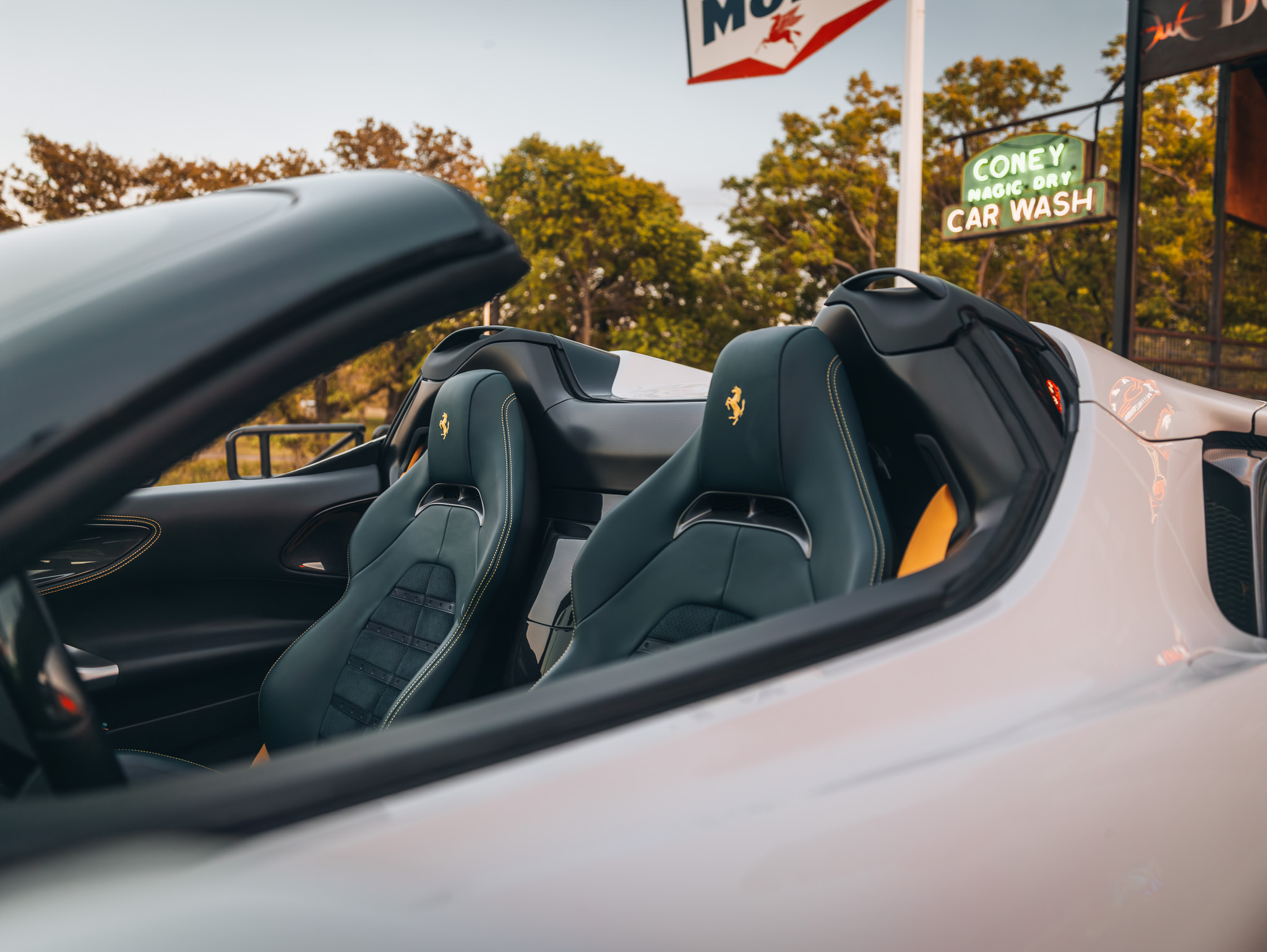 Luxury Ferrari interior showcasing Double E Lifestyle experiences in Texas.