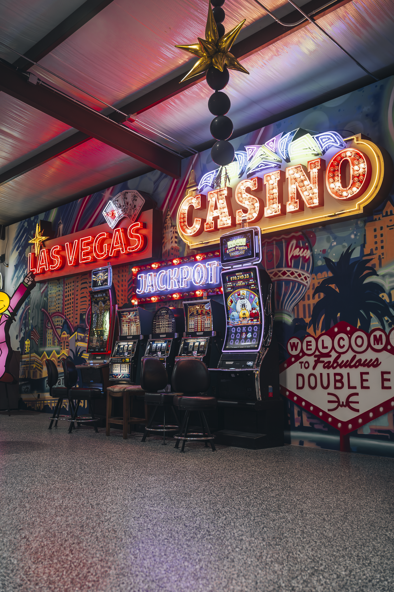 Double E Lifestyle event featuring casino games and Las Vegas themed decor.