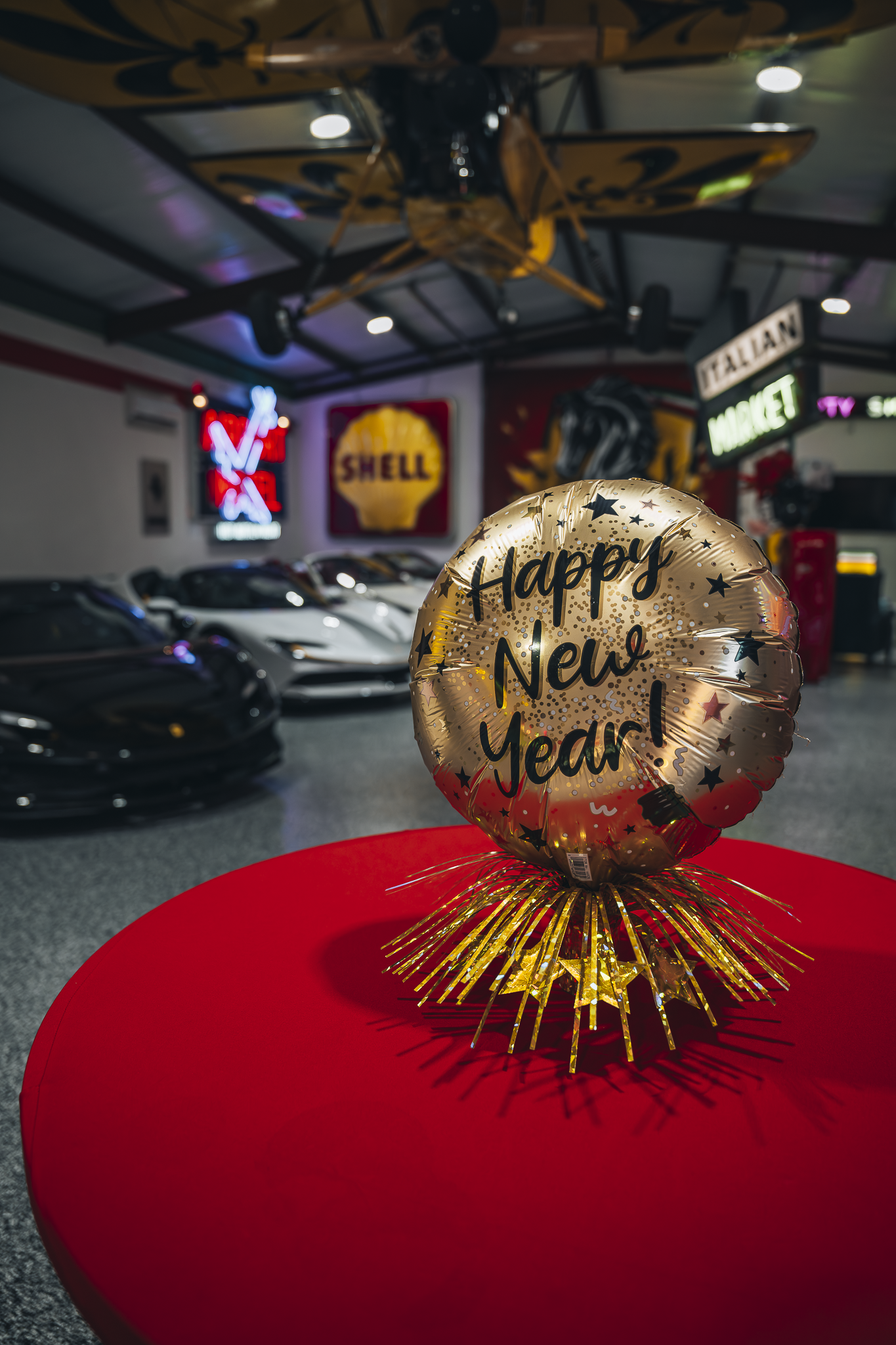 Double E Lifestyle event featuring a gold balloon and red decor in Texas.