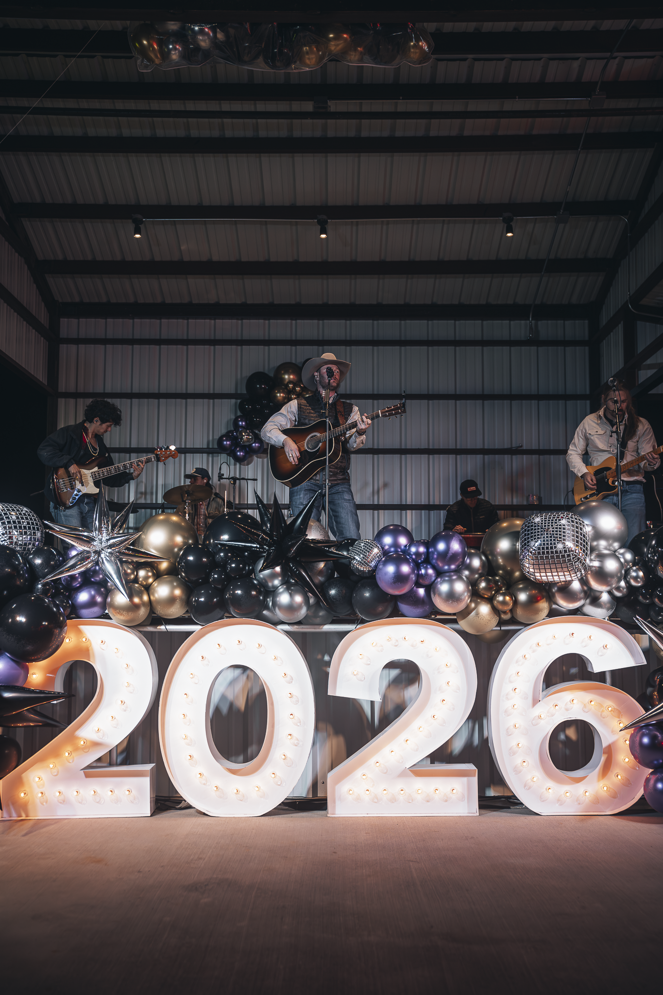 Double E Lifestyle event with live music and a 2026 balloon display.
