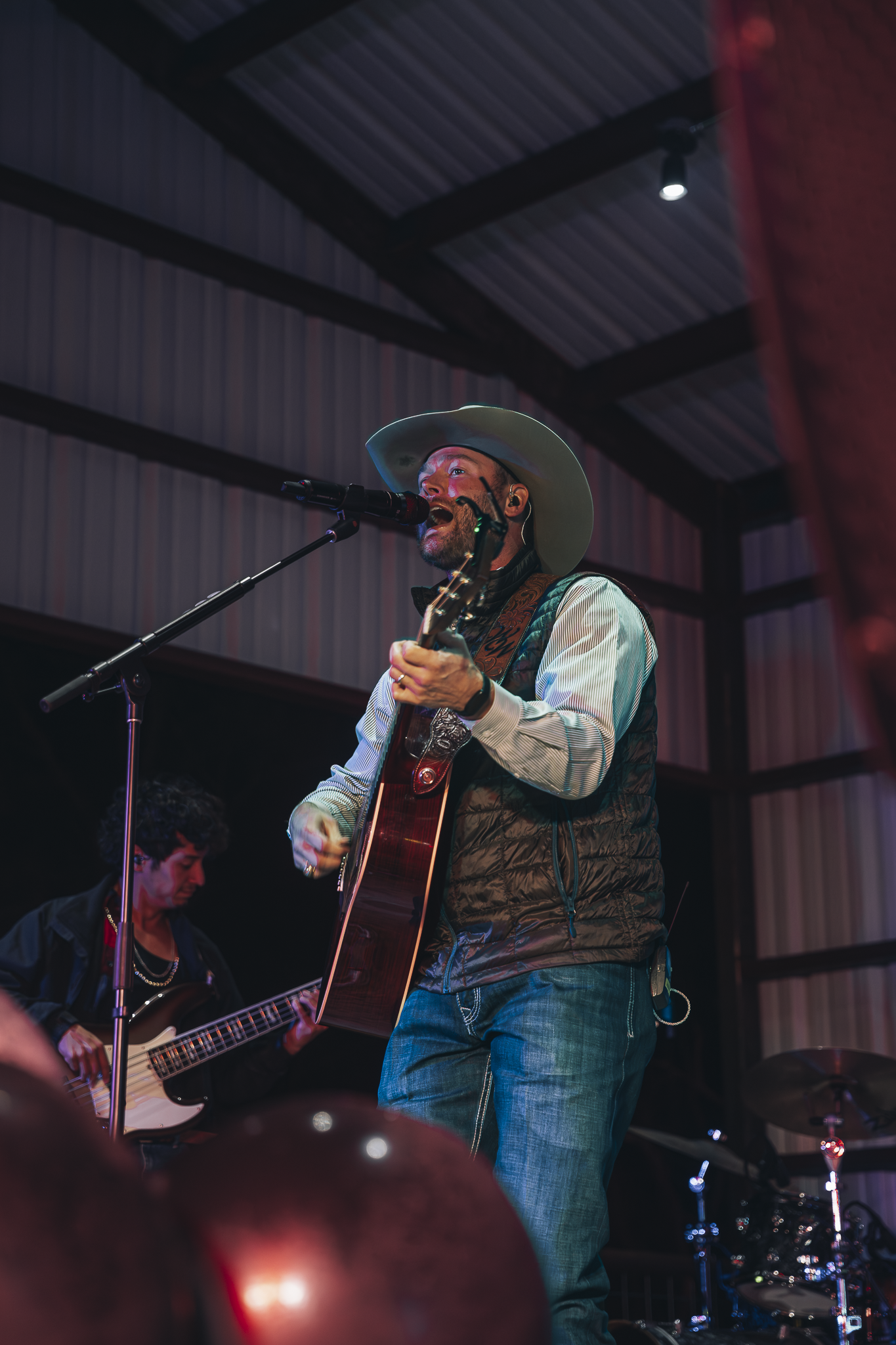 Musician performing live music at Double E Lifestyle event in Texas.