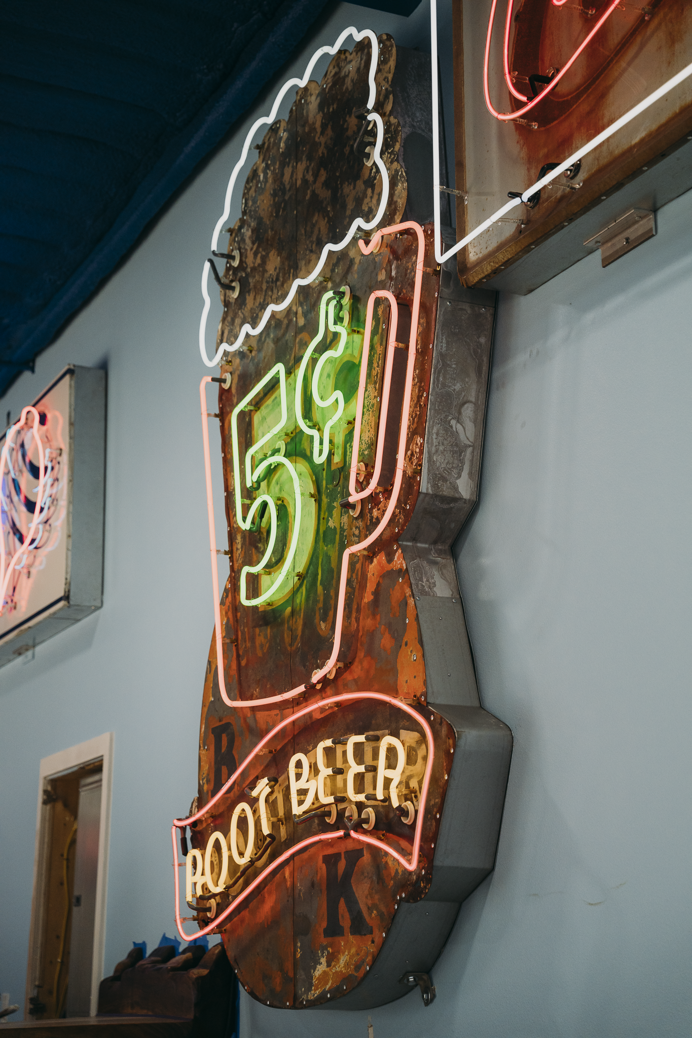 Vintage Double E Lifestyle neon sign advertising root beer and drinks.